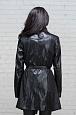 Куртка черного цвета из эко-кожи с поясом фото №1